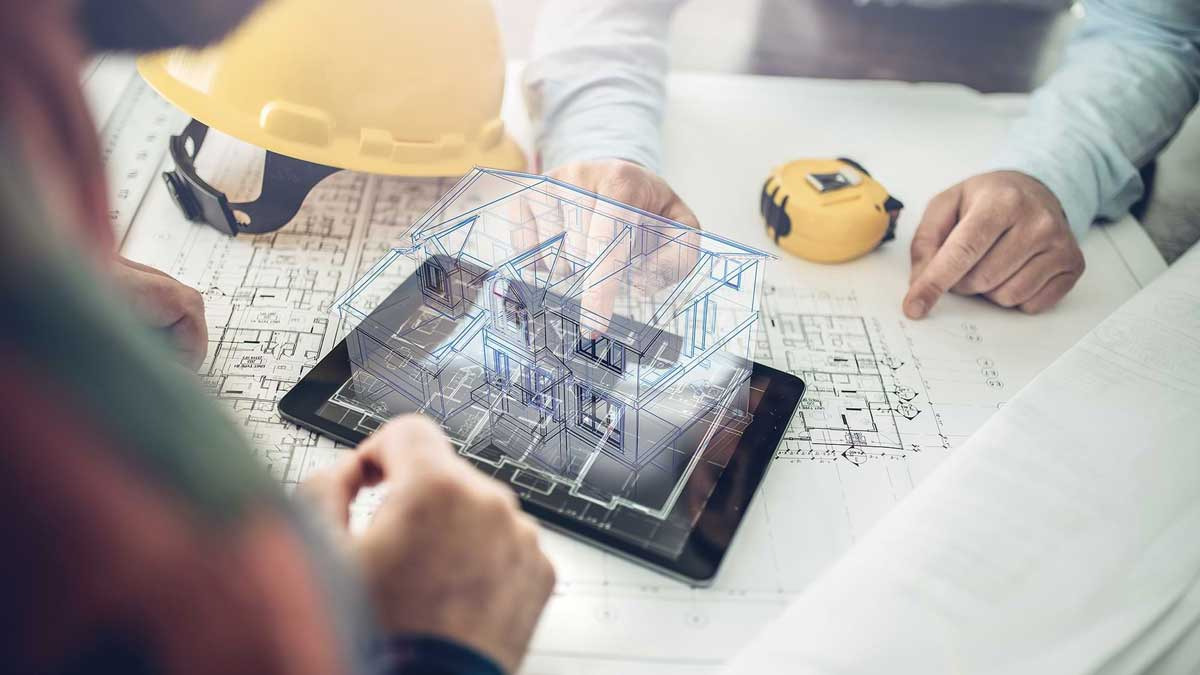 An architect's drawing with a tablet on top. A holographic visualisation of a building appears from the tablet. A yellow building site helmet and a tape measure lie next to it. People can be seen interacting with the hologram.